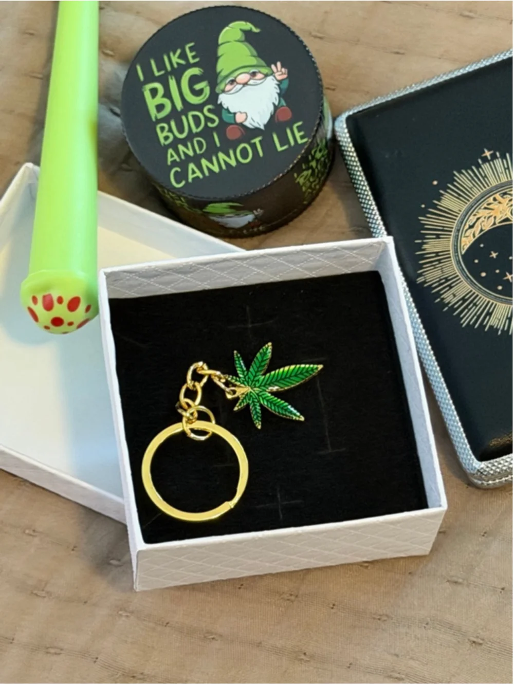 Aura’s Oddities “Maple Leaf” Mary Jane green and gold key chain in a gift box